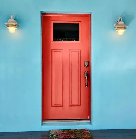 a room with pool table windows and stairs