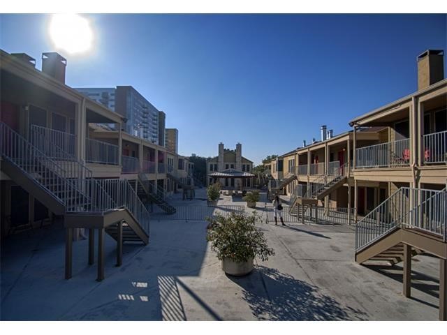 2529 Rio Grande Street, Unit 69 Austin, TX 78705 - Photo 20 of 25 a view of a house with backyard porch and sitting area