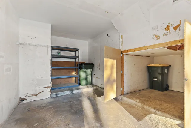 a view of a room with a flat screen tv