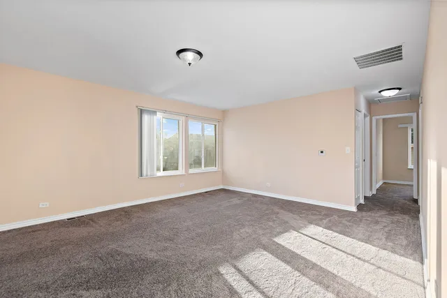 a view of an empty room with window