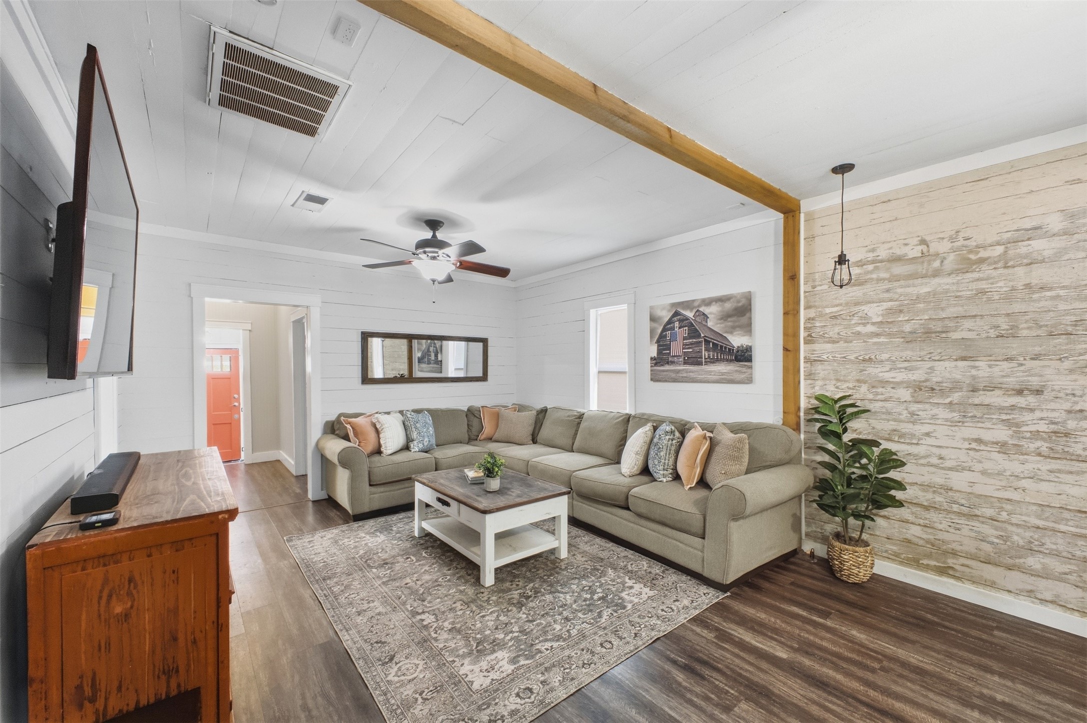 1903 Tigerpoint Road Brenham, TX 77833 - Photo 4 of 27 a living room with furniture and a flat screen tv