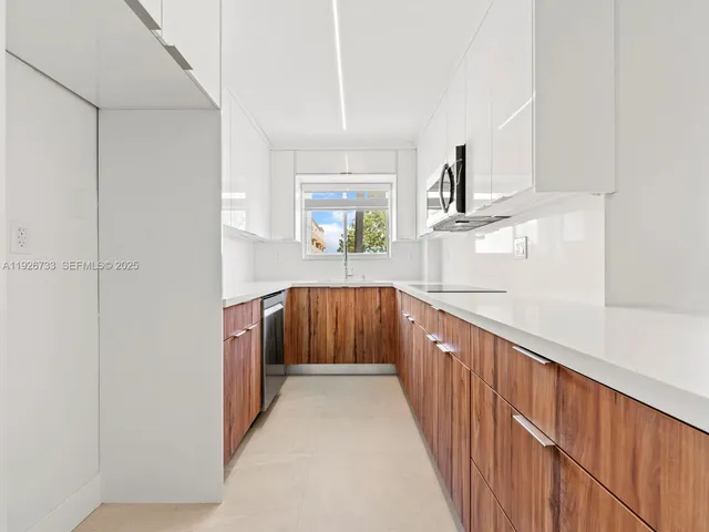 a bathroom with sink and mirror