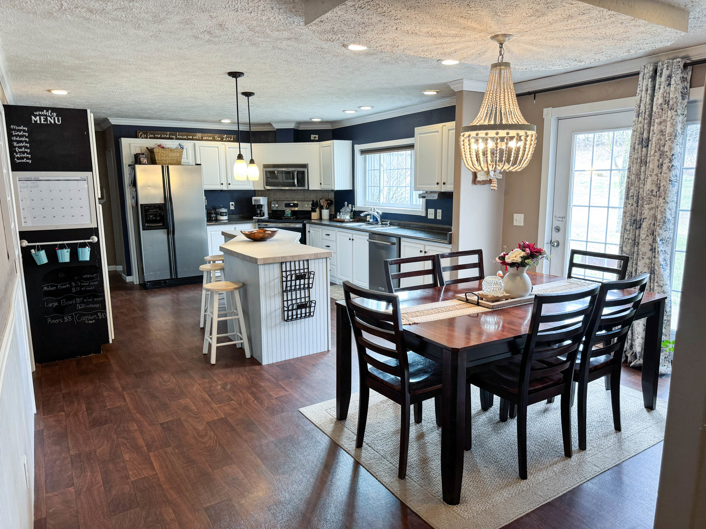 385 Toledo Cemetery Road Cobden, IL 62920 - Photo 20 of 38 a view of a dining room with furniture and wooden floor