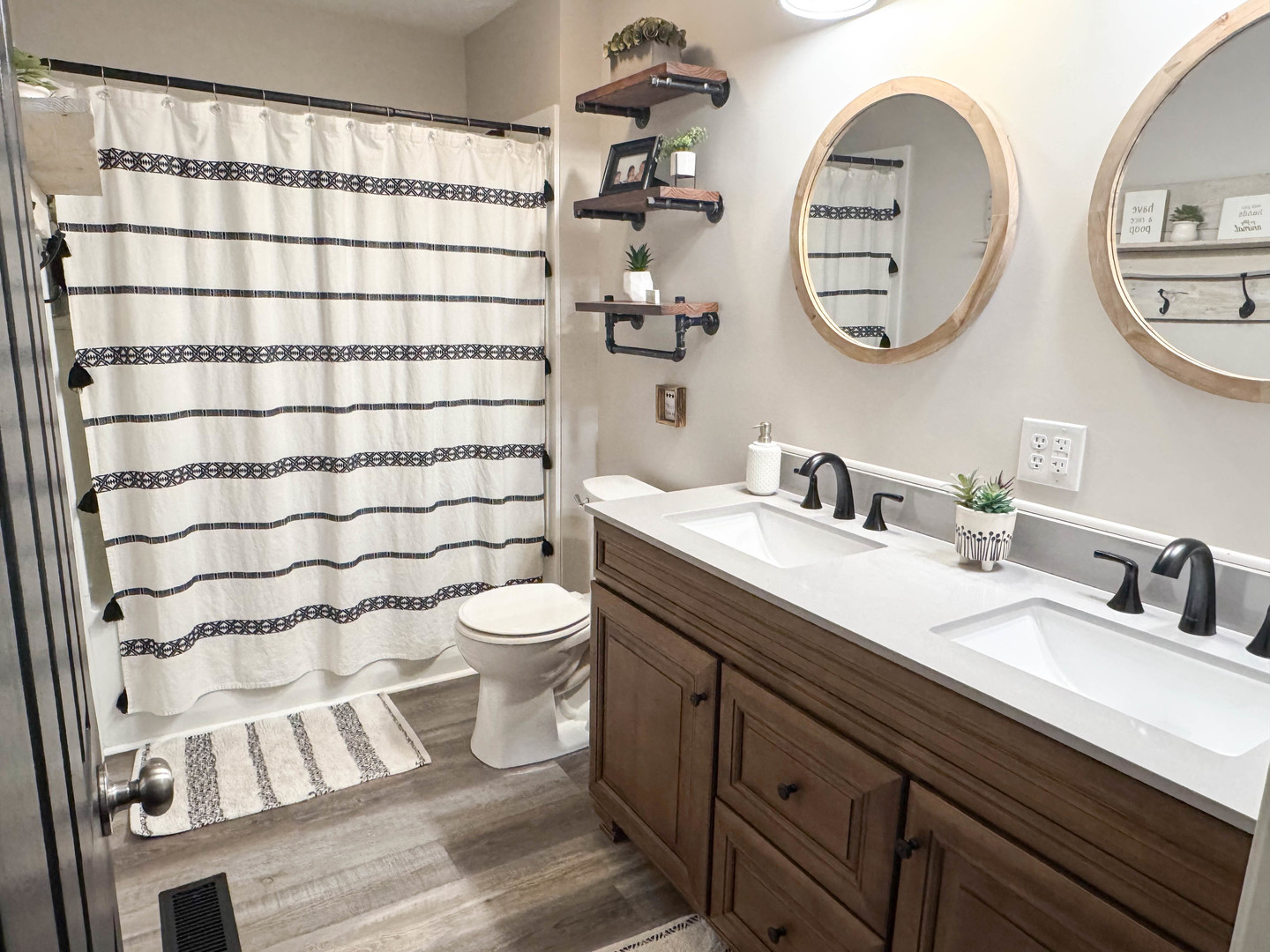 385 Toledo Cemetery Road Cobden, IL 62920 - Photo 31 of 38 a bathroom with a toilet a sink and a mirror