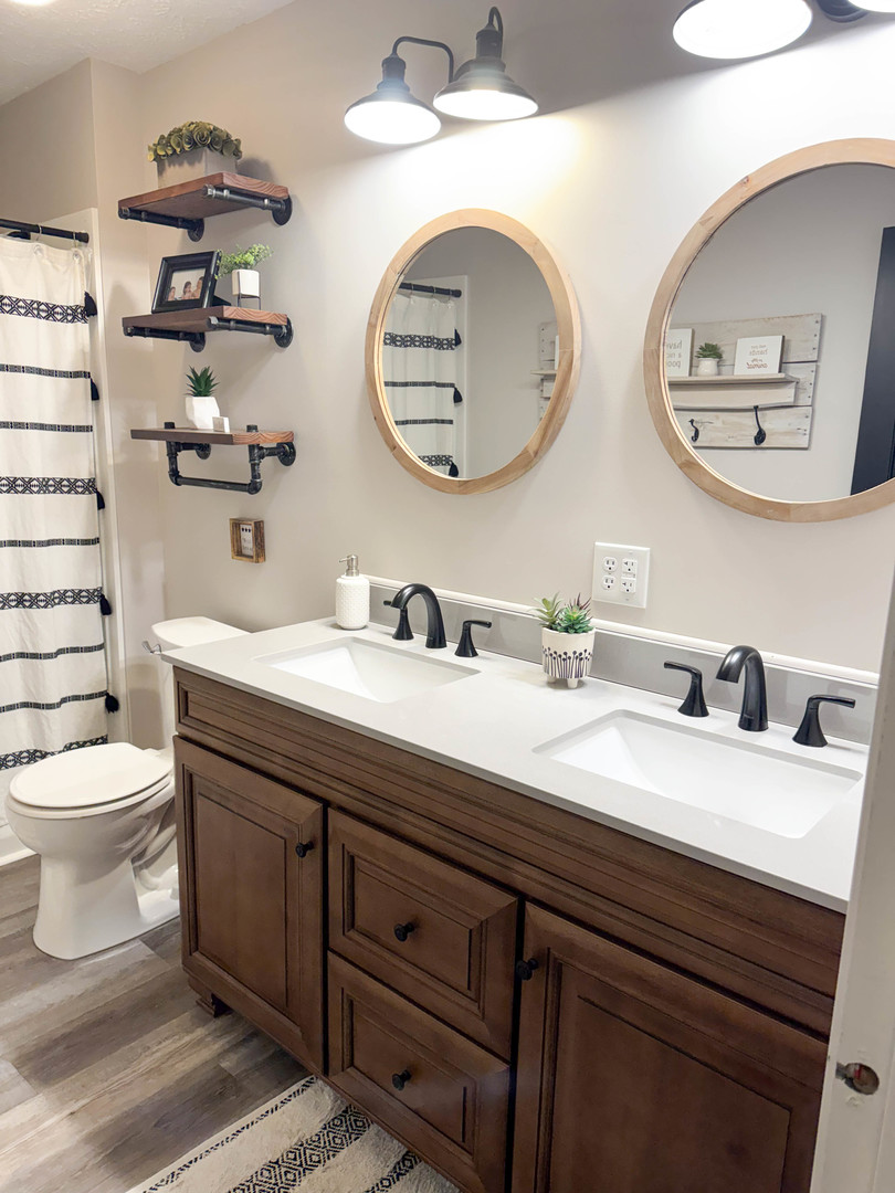 385 Toledo Cemetery Road Cobden, IL 62920 - Photo 32 of 38 a bathroom with a toilet a sink and a mirror