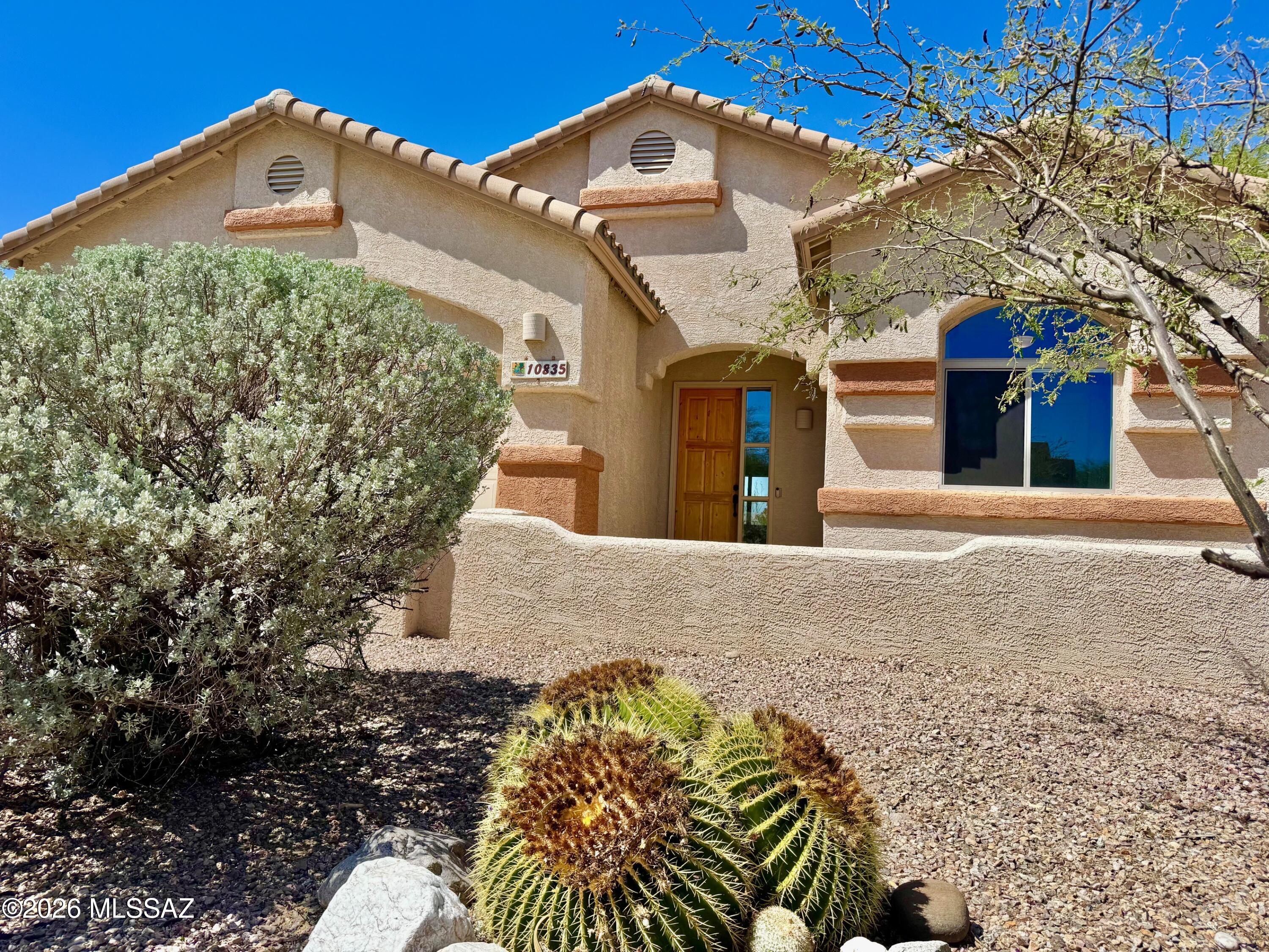 10835 South Heart Break Ridge Place Vail, AZ 85641 - Photo 47 of 49 a front view of a house