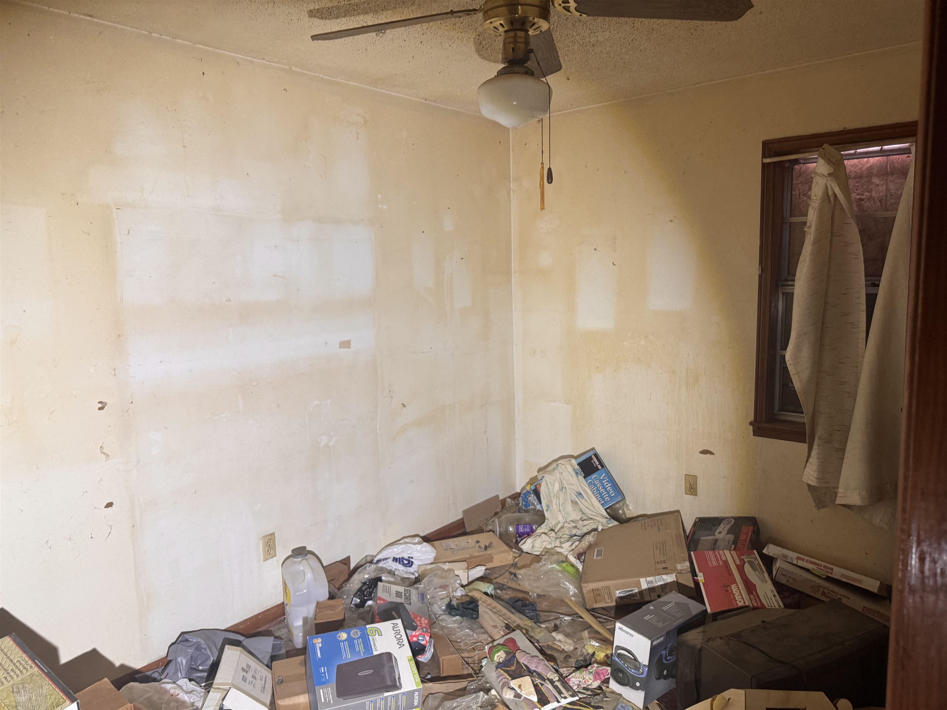 3251 Sinclair Street Memphis, TN 38127 - Photo 7 of 9 Unfurnished bedroom featuring a textured ceiling and a ceiling fan