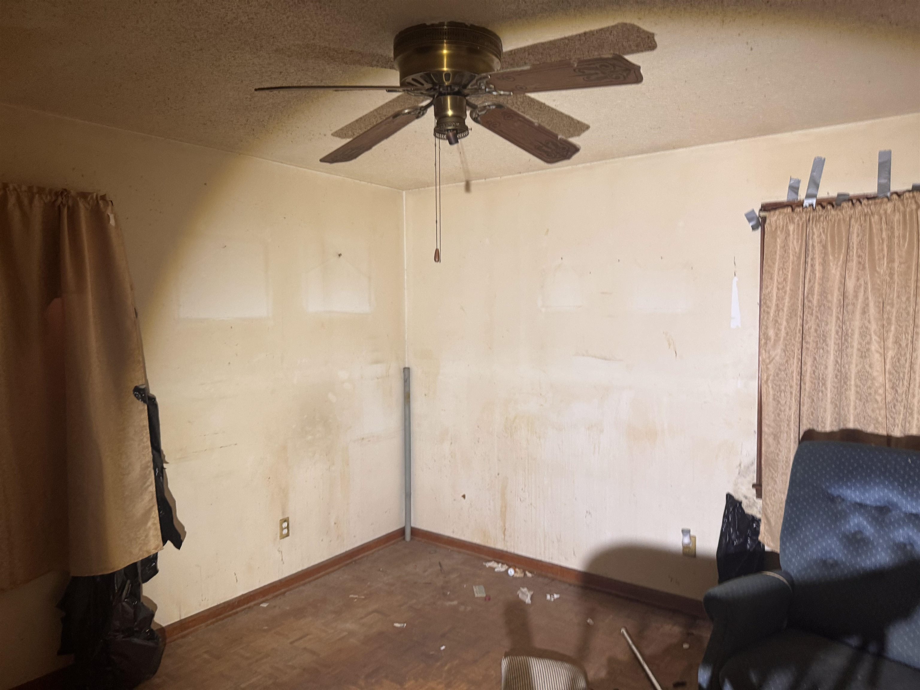3251 Sinclair Street Memphis, TN 38127 - Photo 8 of 9 Unfurnished room with a textured ceiling and ceiling fan