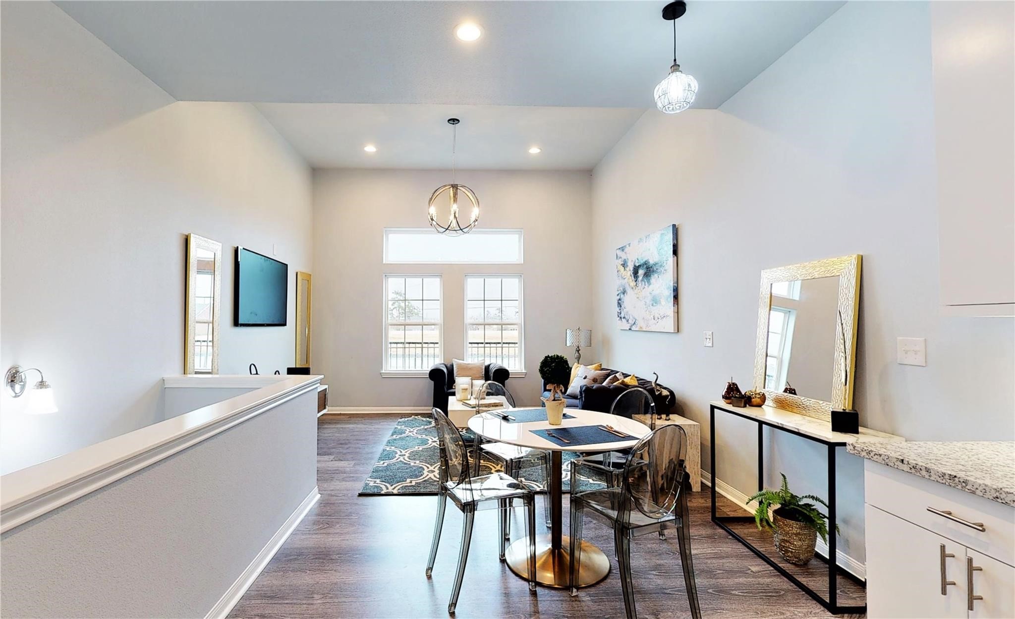 4924 Paradigm Ln Spring Spring, TX 77379 - Photo 6 of 18 Modern living area with high ceilings and ample natural light. Ideal for entertaining.