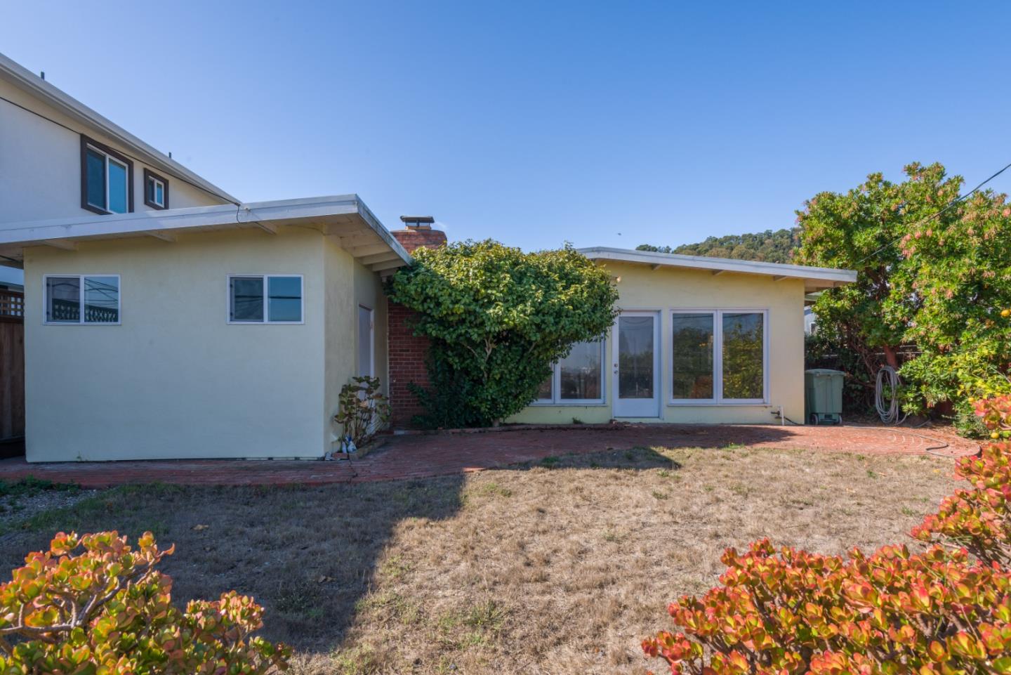 758 Pepper Drive San Bruno, CA 94066 - Photo 16 of 17 a front view of a house with a yard