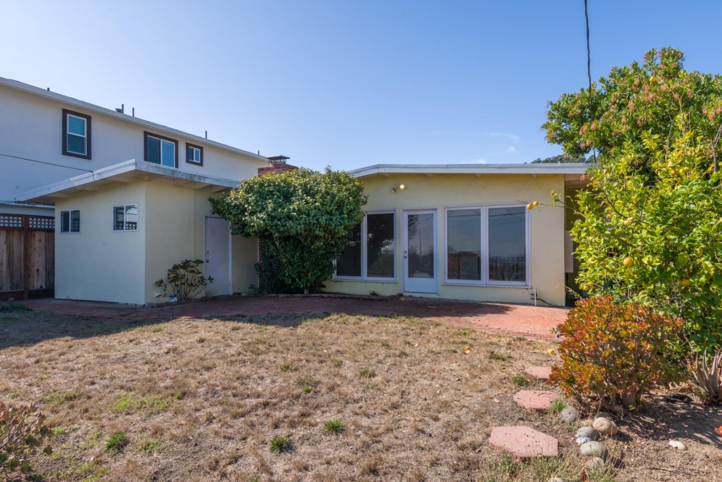 758 Pepper Drive San Bruno, CA 94066 - Photo 17 of 17 a front view of a house with a yard