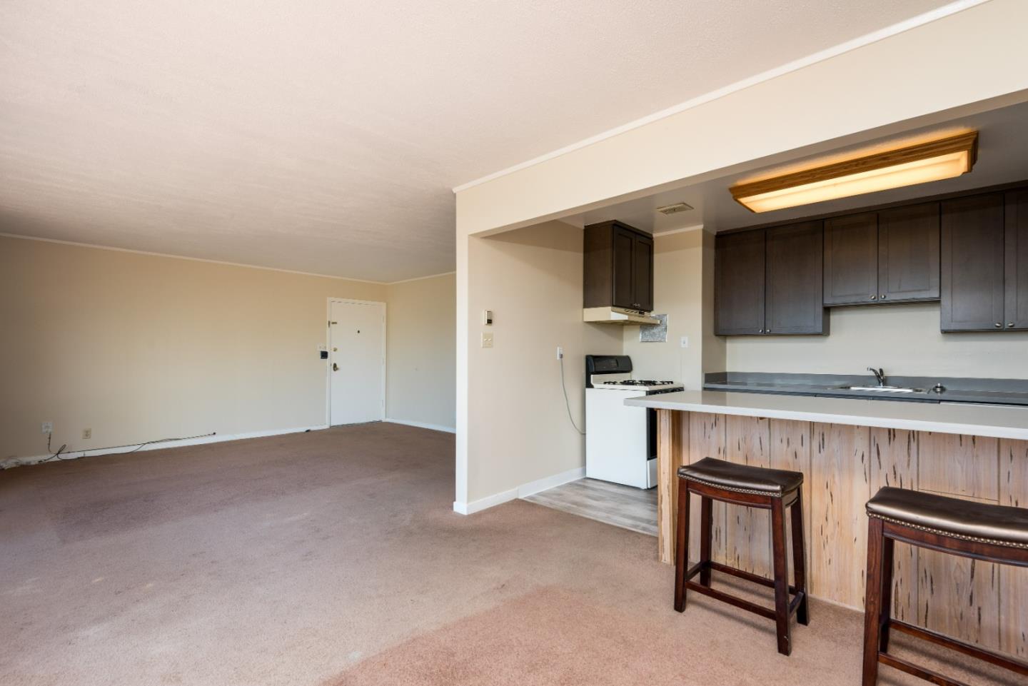 758 Pepper Drive San Bruno, CA 94066 - Photo 5 of 17 a kitchen with a table and chairs in it