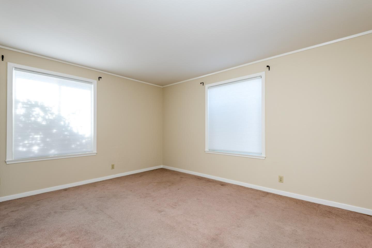 758 Pepper Drive San Bruno, CA 94066 - Photo 9 of 17 an empty room with a window