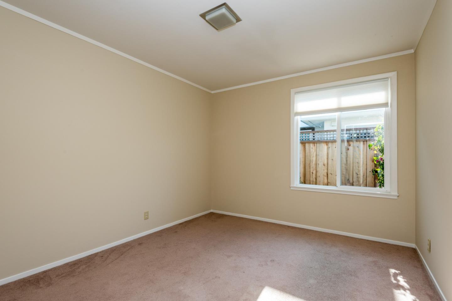 758 Pepper Drive San Bruno, CA 94066 - Photo 10 of 17 an empty room with a window