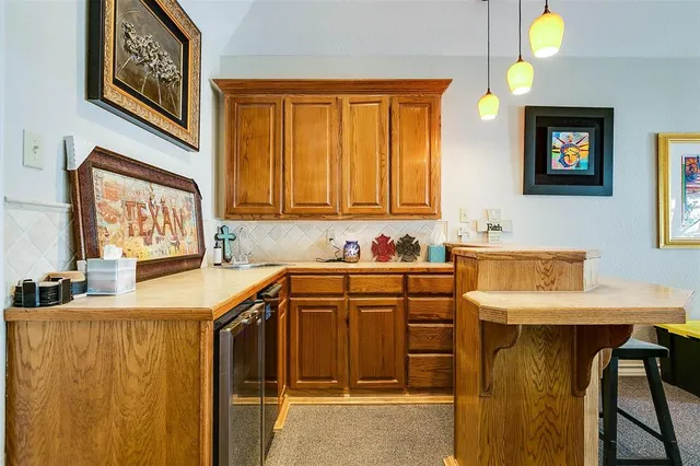 a view of a house with a snow in the yard