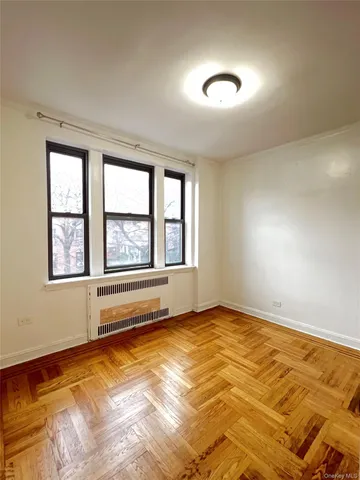 a view of an empty room and window
