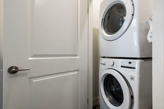 a living room with couch and a window