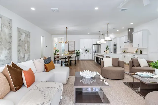 a bedroom with a bed and chair