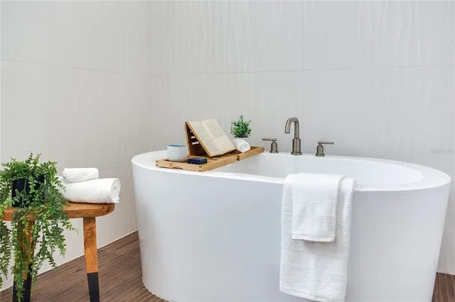 a view of a house with a yard and garage