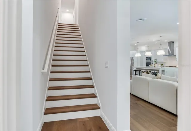 a view of a backyard with sitting area