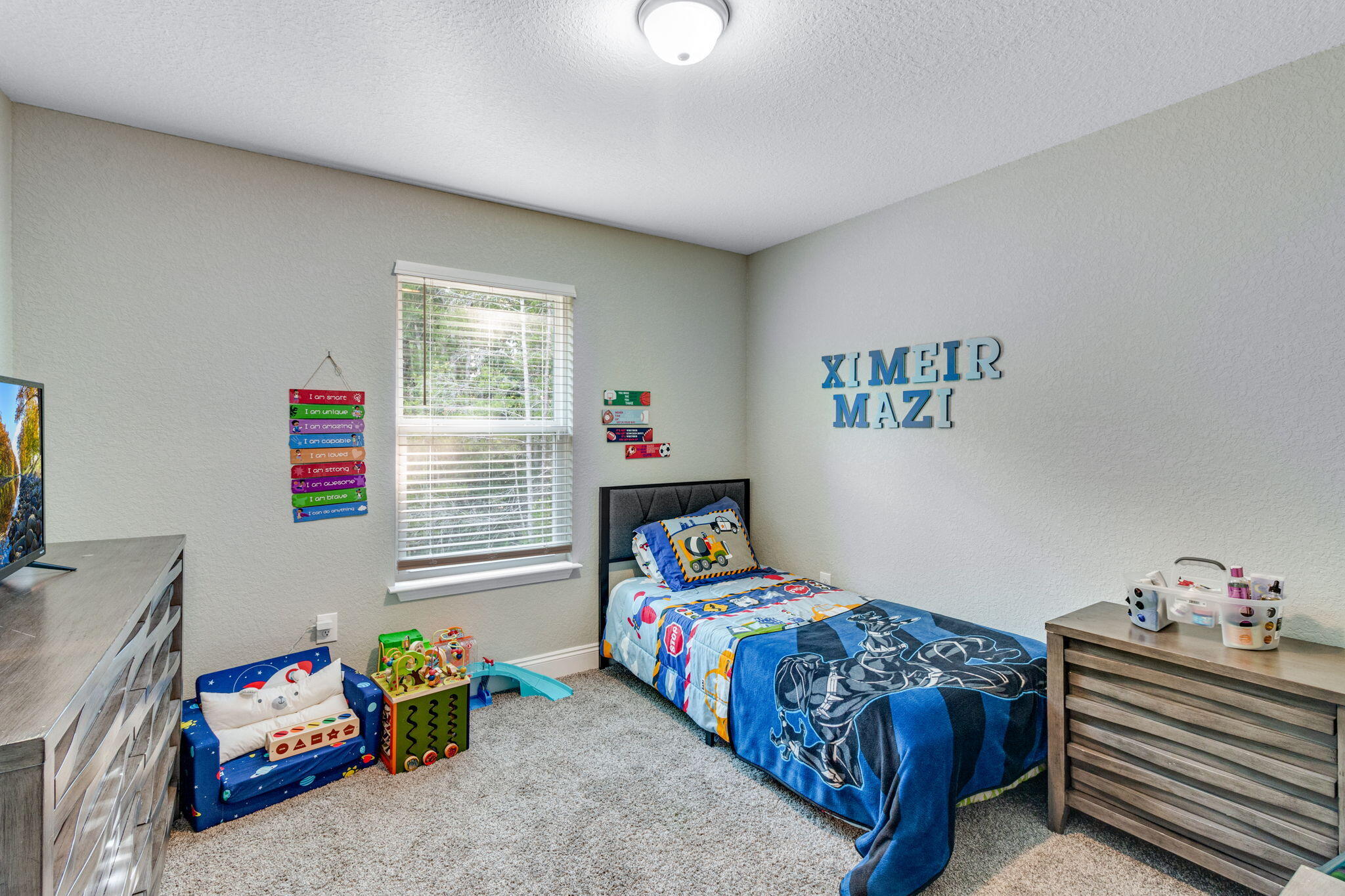 107 Eastview Drive Crestview, FL 32536 - Photo 16 of 23 a bedroom with a bed and a window