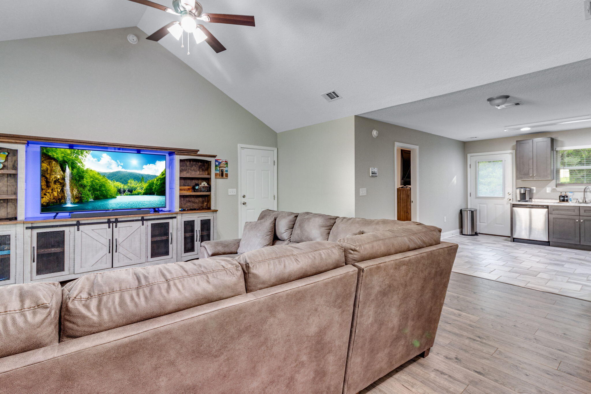 107 Eastview Drive Crestview, FL 32536 - Photo 10 of 23 a living room with furniture and a flat screen tv