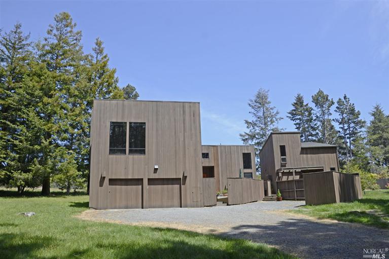 35915 Sea Ridge Road The Sea Ranch, CA 95497 - Photo 1 of 1 a view of a house with a backyard