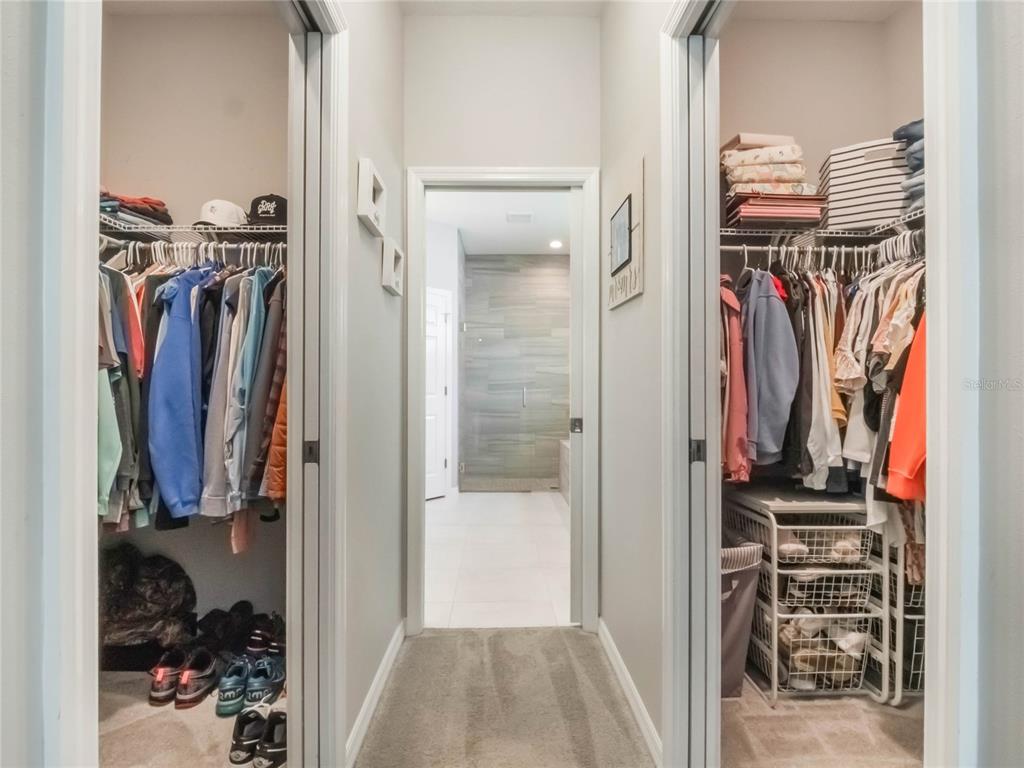 4735 Northwest 11th Court Ocala, FL 34475 - Photo 20 of 34 a view of walk in closet with clothes and shoes