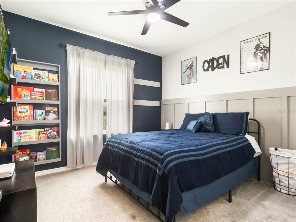 4735 Northwest 11th Court Ocala, FL 34475 - Photo 24 of 34 a bedroom with a bed and window