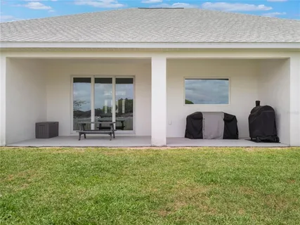 a view of a house with a big yard