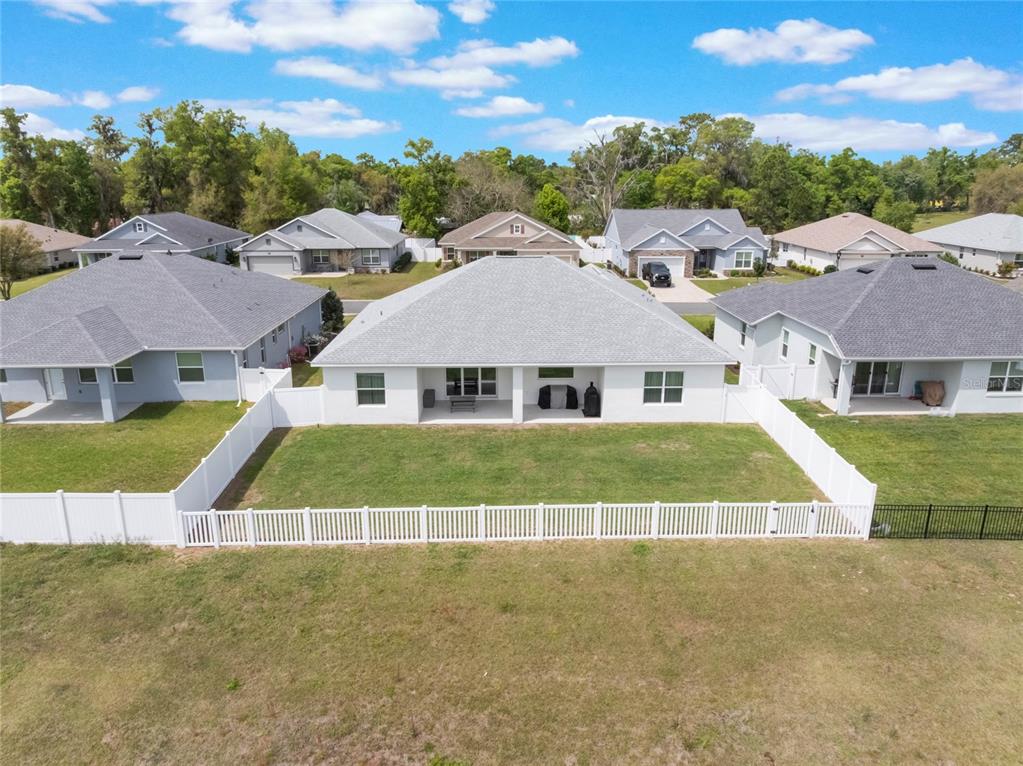 4735 Northwest 11th Court Ocala, FL 34475 - Photo 33 of 34 a view of a house with a big yard