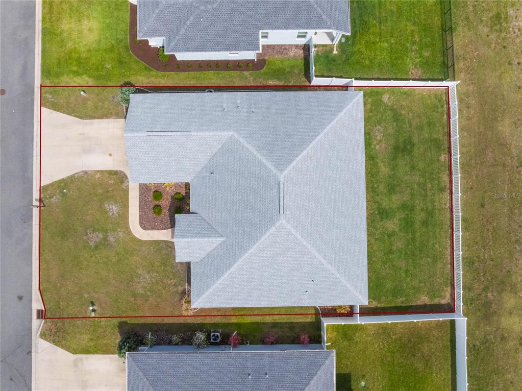 4735 Northwest 11th Court Ocala, FL 34475 - Photo 34 of 34 an aerial view of a house with a yard