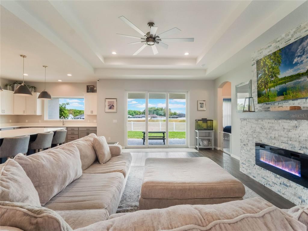 4735 Northwest 11th Court Ocala, FL 34475 - Photo 6 of 34 a living room with furniture and a fireplace