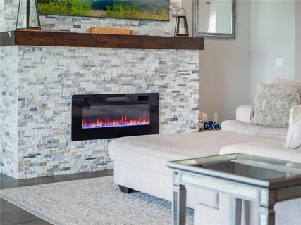 a kitchen with a stove and a fireplace