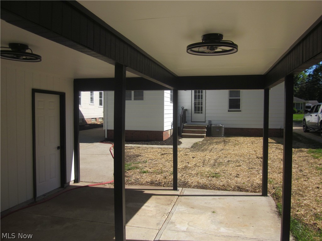 1810 Lorimer Road Cleveland, OH 44134 - Photo 45 of 47 View of terrace featuring a carport