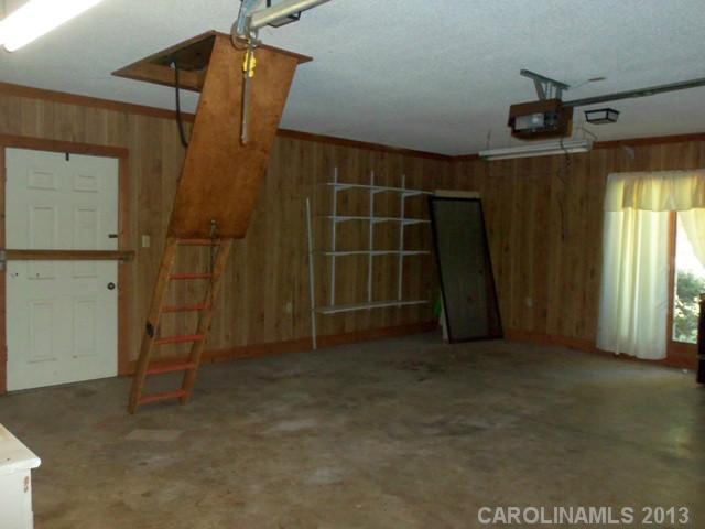 2949 Cat Square Road Vale, NC 28168 - Photo 9 of 10 a view of an empty room with a fireplace