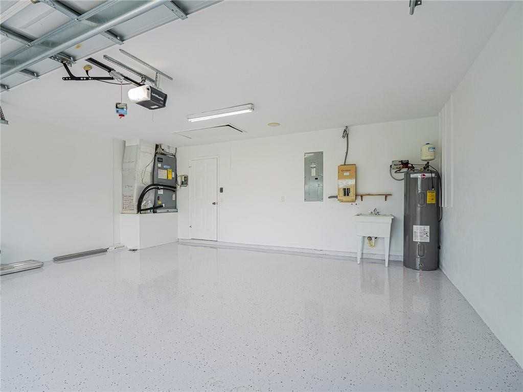 6445 55th Square Vero Beach, FL 32967 - Photo 28 of 36 a view of a storage & utility room