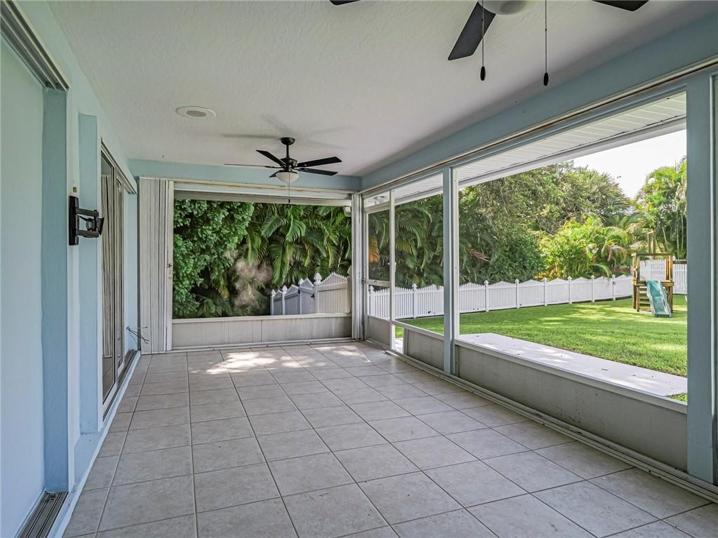 6445 55th Square Vero Beach, FL 32967 - Photo 31 of 36 a view of a room with porch and balcony
