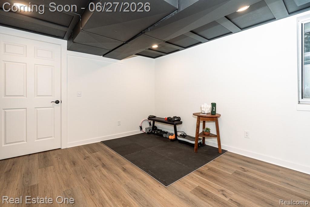 1222 Kings Cove Court, Unit 244 Rochester, MI 48306 - Photo 29 of 44 Finished area in basement has privacy door