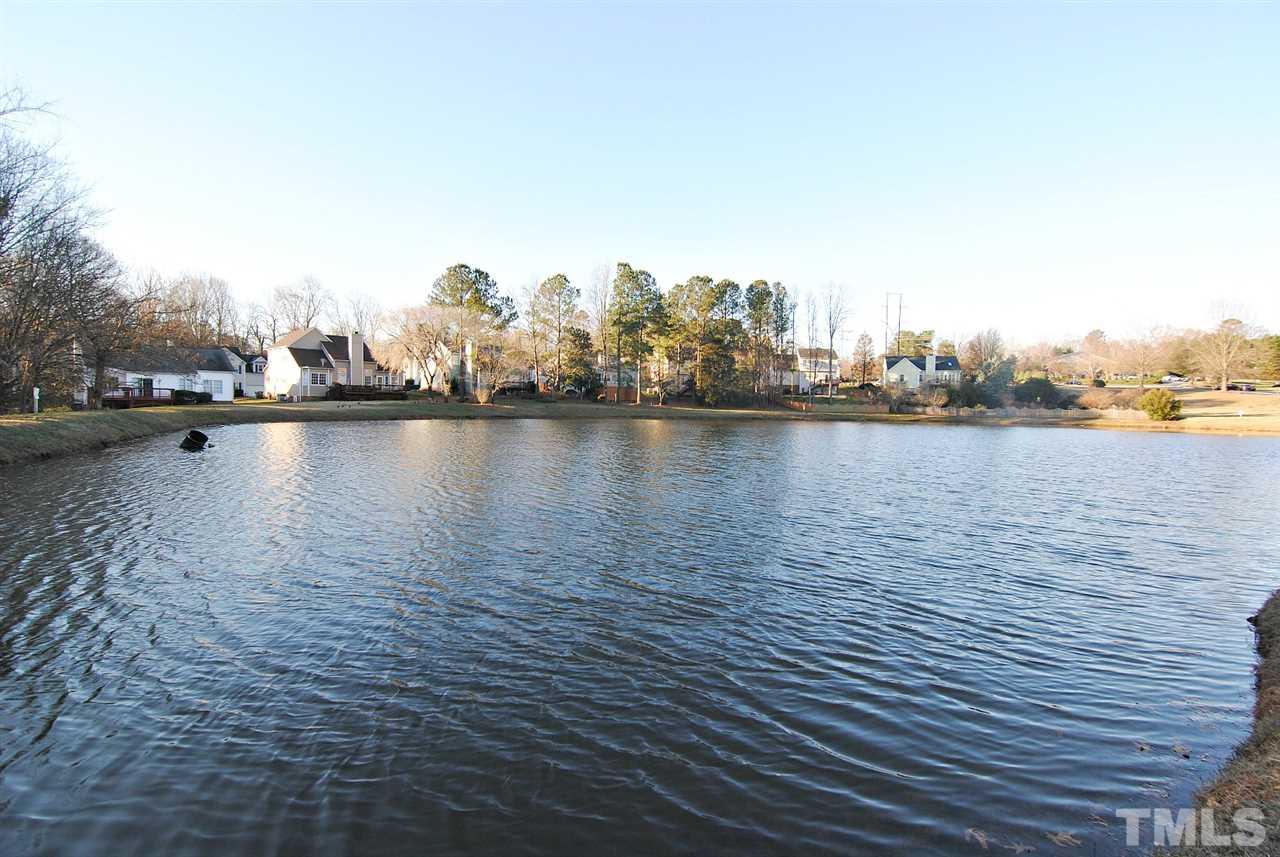2216 Dahlgreen Road Raleigh, NC 27615 - Photo 1 of 22 a view of a lake with houses