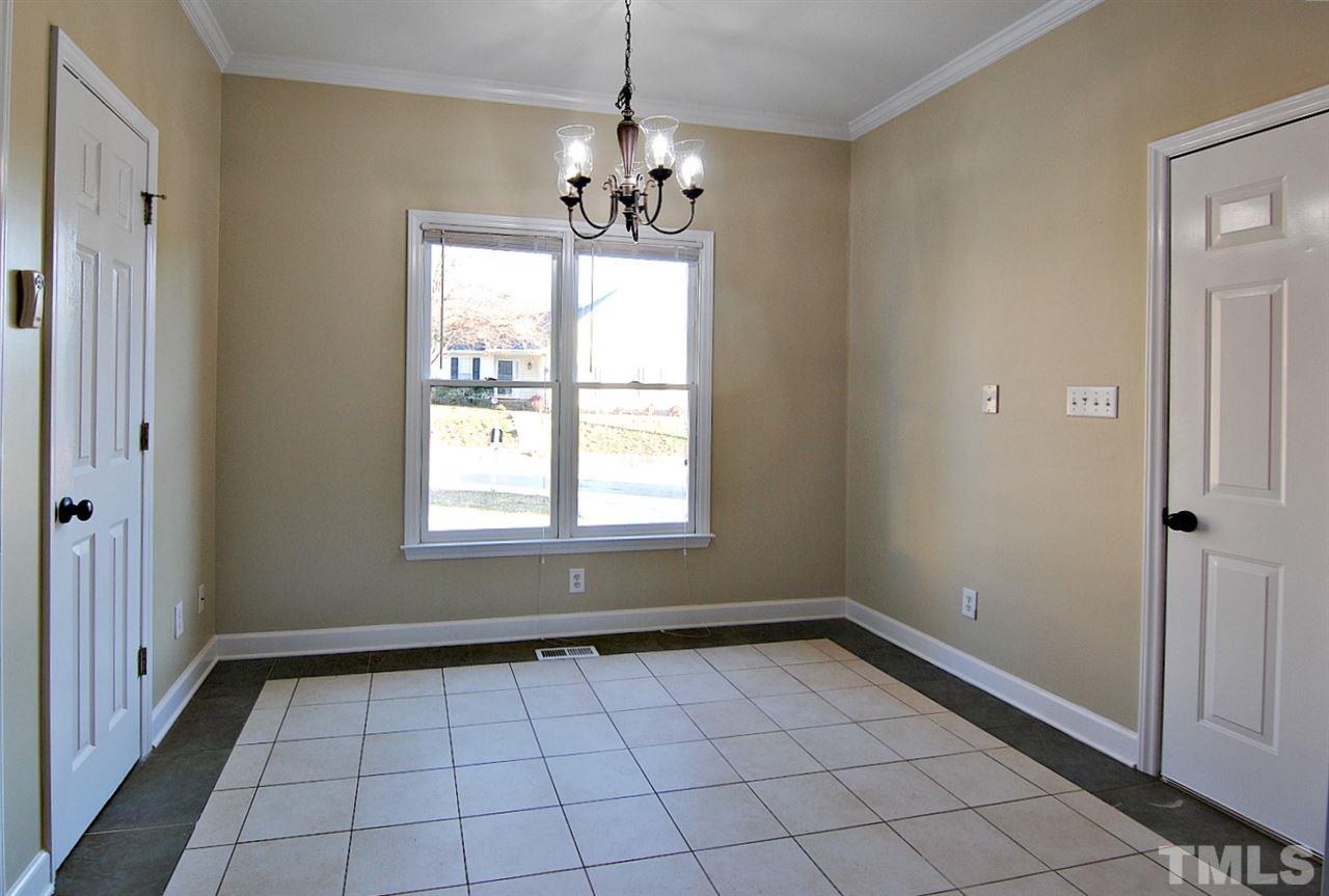 2216 Dahlgreen Road Raleigh, NC 27615 - Photo 13 of 22 a view of an empty room with a window
