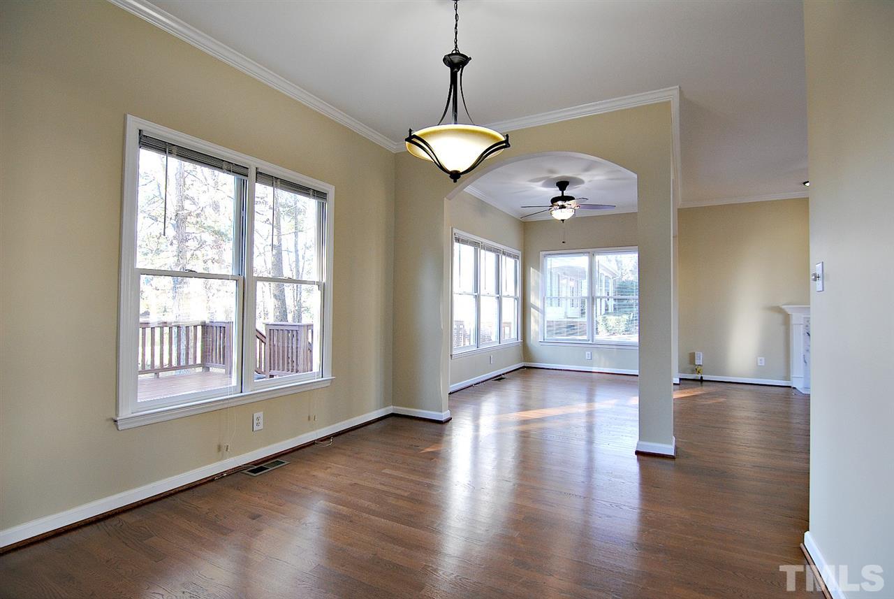 2216 Dahlgreen Road Raleigh, NC 27615 - Photo 6 of 22 a view of an room with wooden floor and a window