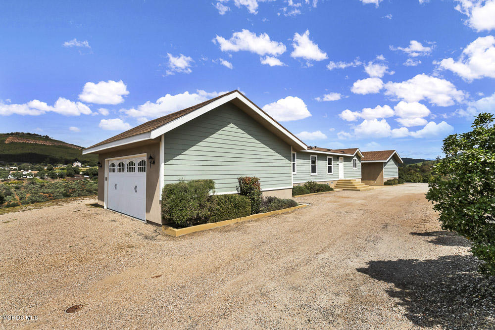 15535 LaPeyre Road Moorpark, CA 93021 - Photo 11 of 34 a view of a house with a yard