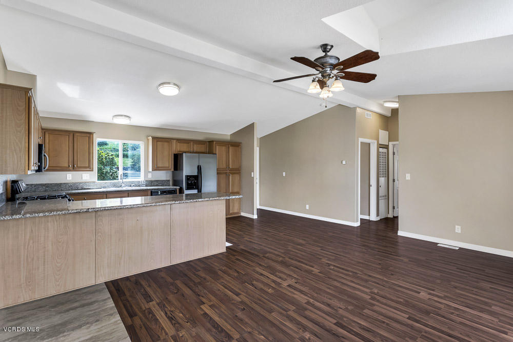 15535 LaPeyre Road Moorpark, CA 93021 - Photo 15 of 34 a view of a living room hardwood floor and a ceiling fan