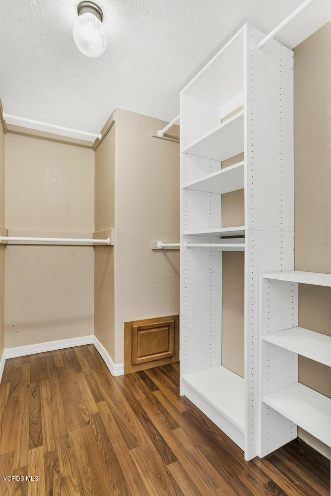 15535 LaPeyre Road Moorpark, CA 93021 - Photo 26 of 34 a view of an empty room with wooden floor and a window