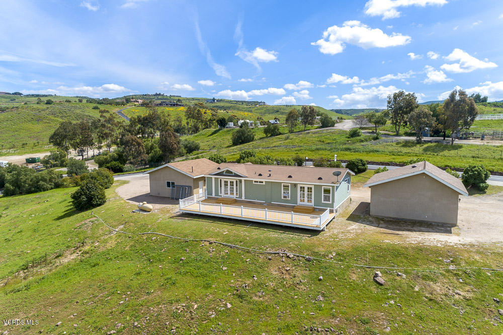 15535 LaPeyre Road Moorpark, CA 93021 - Photo 28 of 34 a view of a house with a big yard