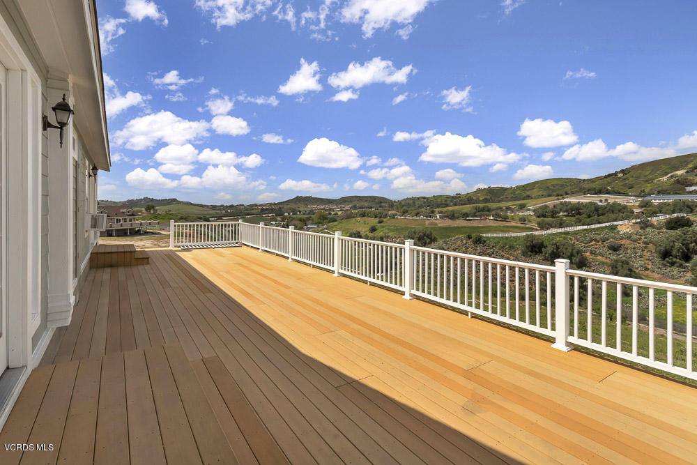 15535 LaPeyre Road Moorpark, CA 93021 - Photo 30 of 34 a view of balcony with wooden floor and city view