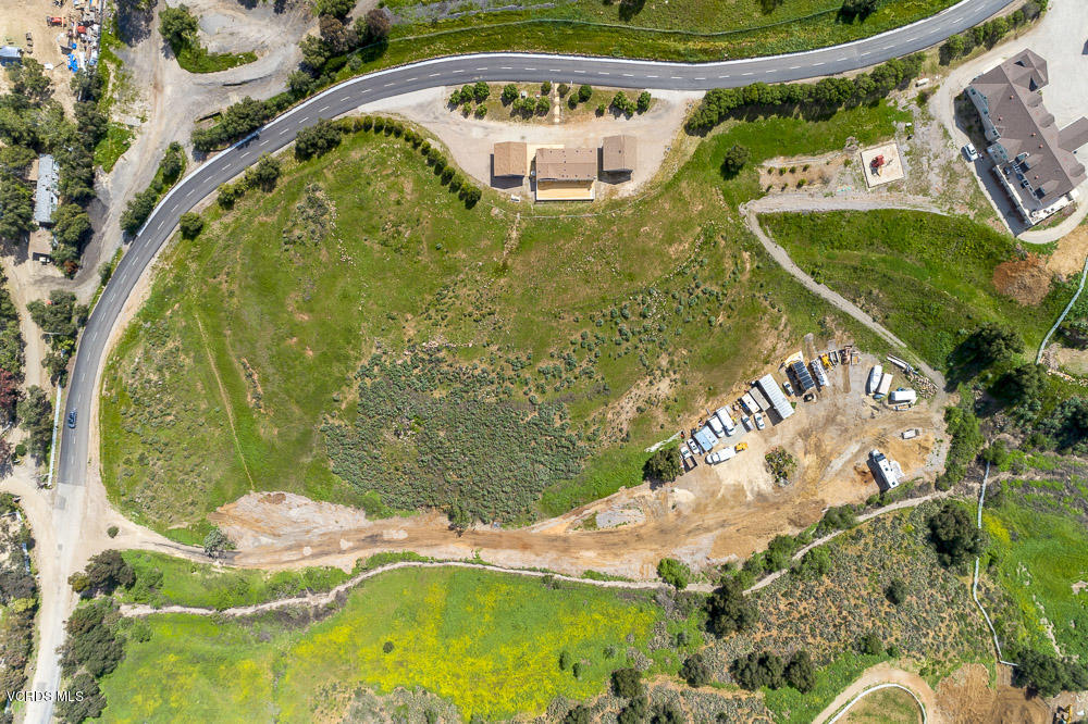 15535 LaPeyre Road Moorpark, CA 93021 - Photo 8 of 34 a view of a swimming pool with a yard and plants