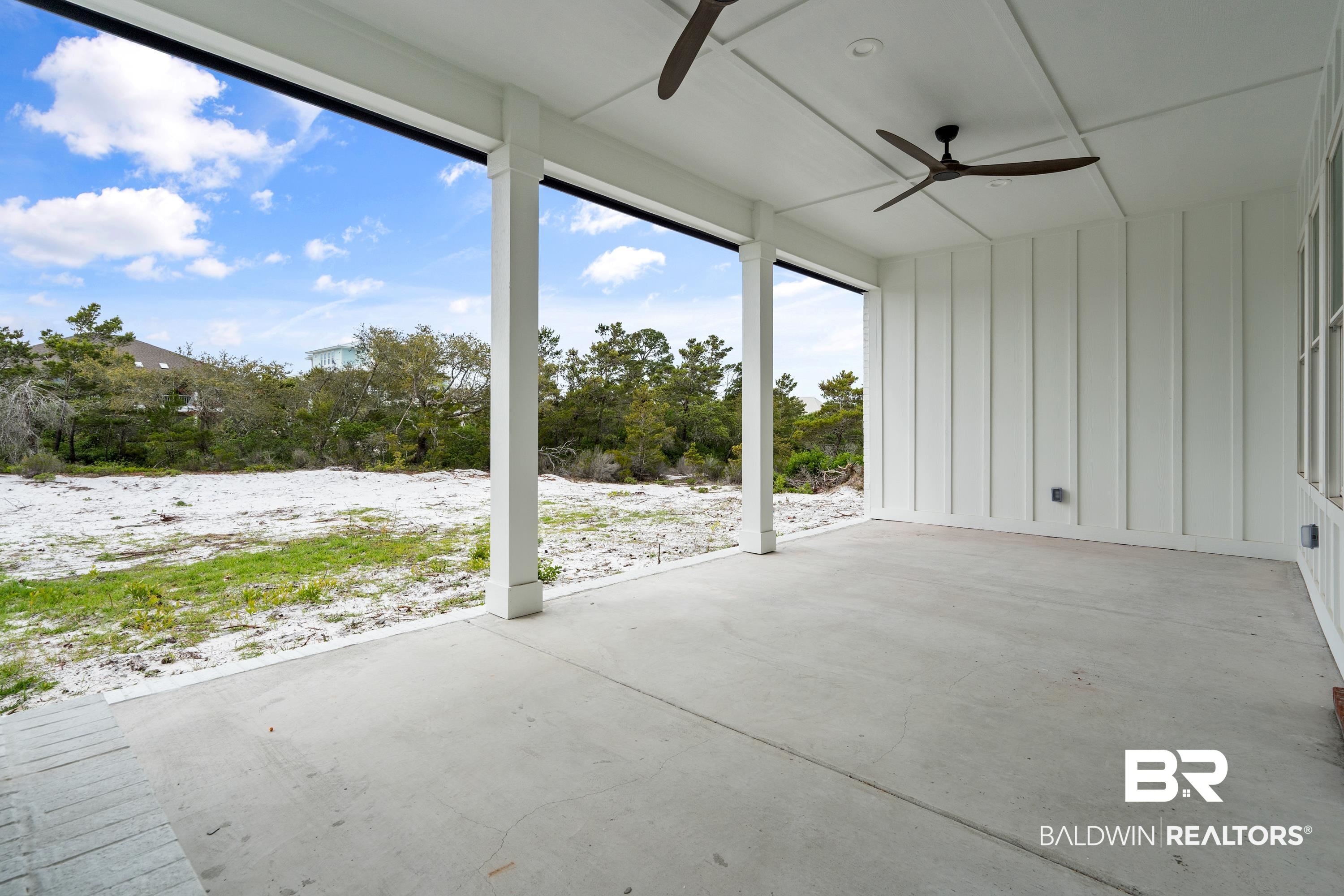30650 Ono N Loop West Orange Beach, AL 36561 - Photo 34 of 38 Unfurnished sunroom featuring ceiling fan