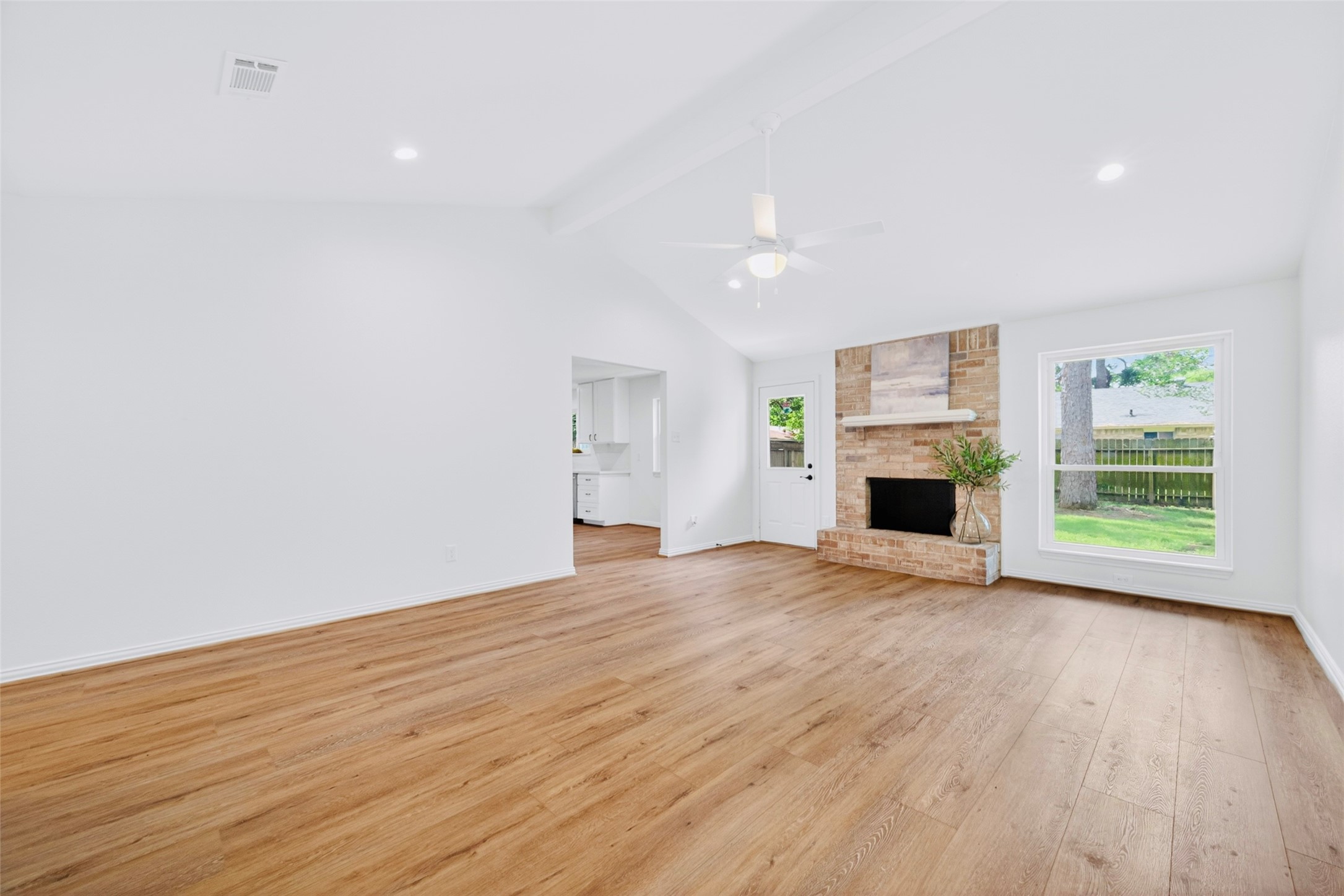 4302 Hickorygate Drive Spring, TX 77373 - Photo 6 of 23 The living room receives plenty of natural light and has a cozy fireplace for those cold winter nights